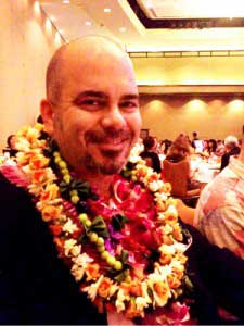 Man with Leis Smiling